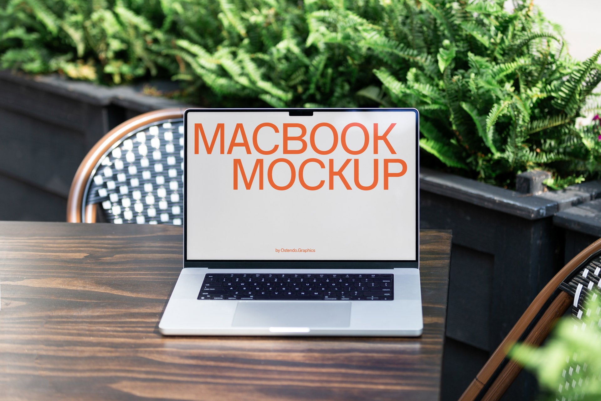 DD38 Macbook Pro Mockup on an Outdoor Table Café