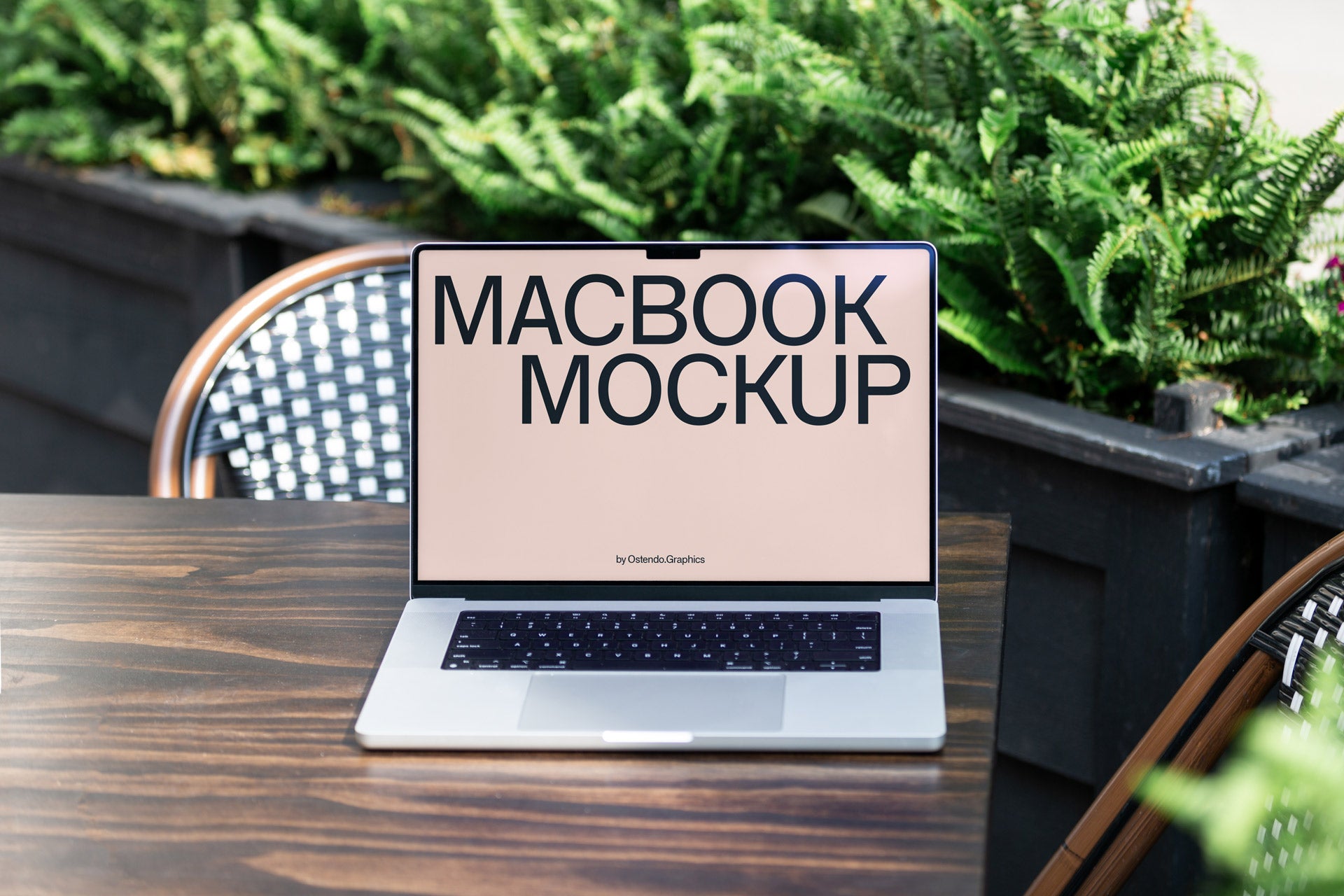 DD38 Macbook Pro Mockup on an Outdoor Table Café