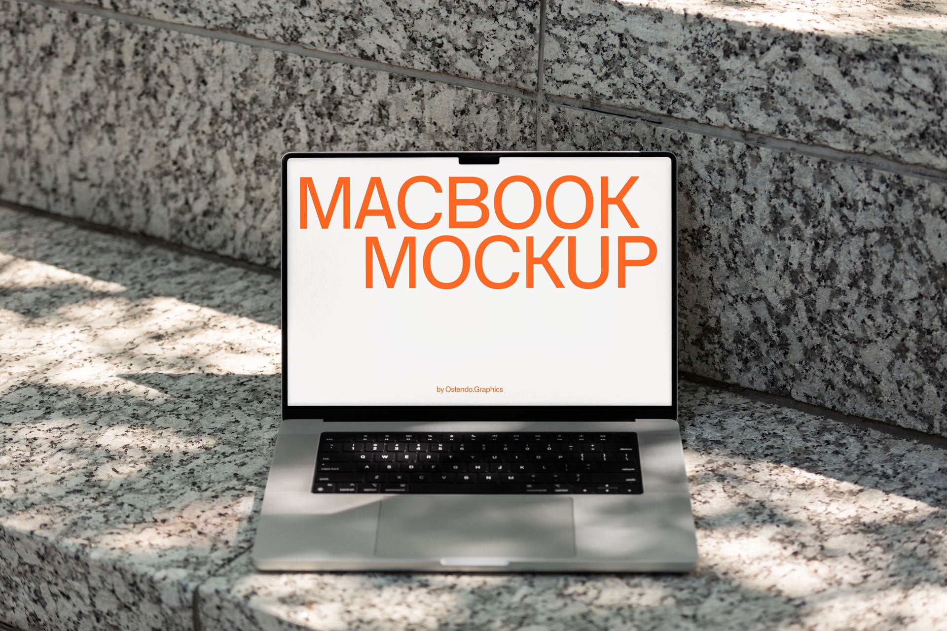 DD41 Macbook Pro Mockup on Urban Outdoor Stone