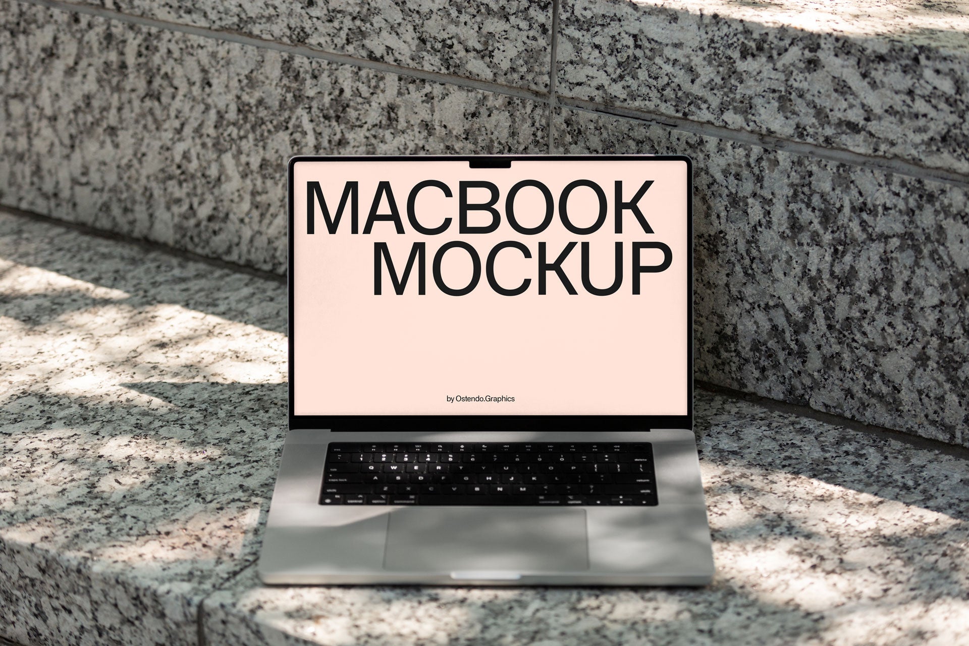DD41 Macbook Pro Mockup on Urban Outdoor Stone