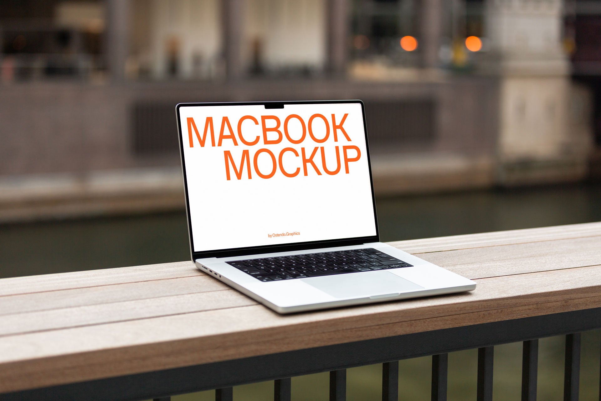 DD50 Macbook Pro Mockup on a Riverwalk Railing