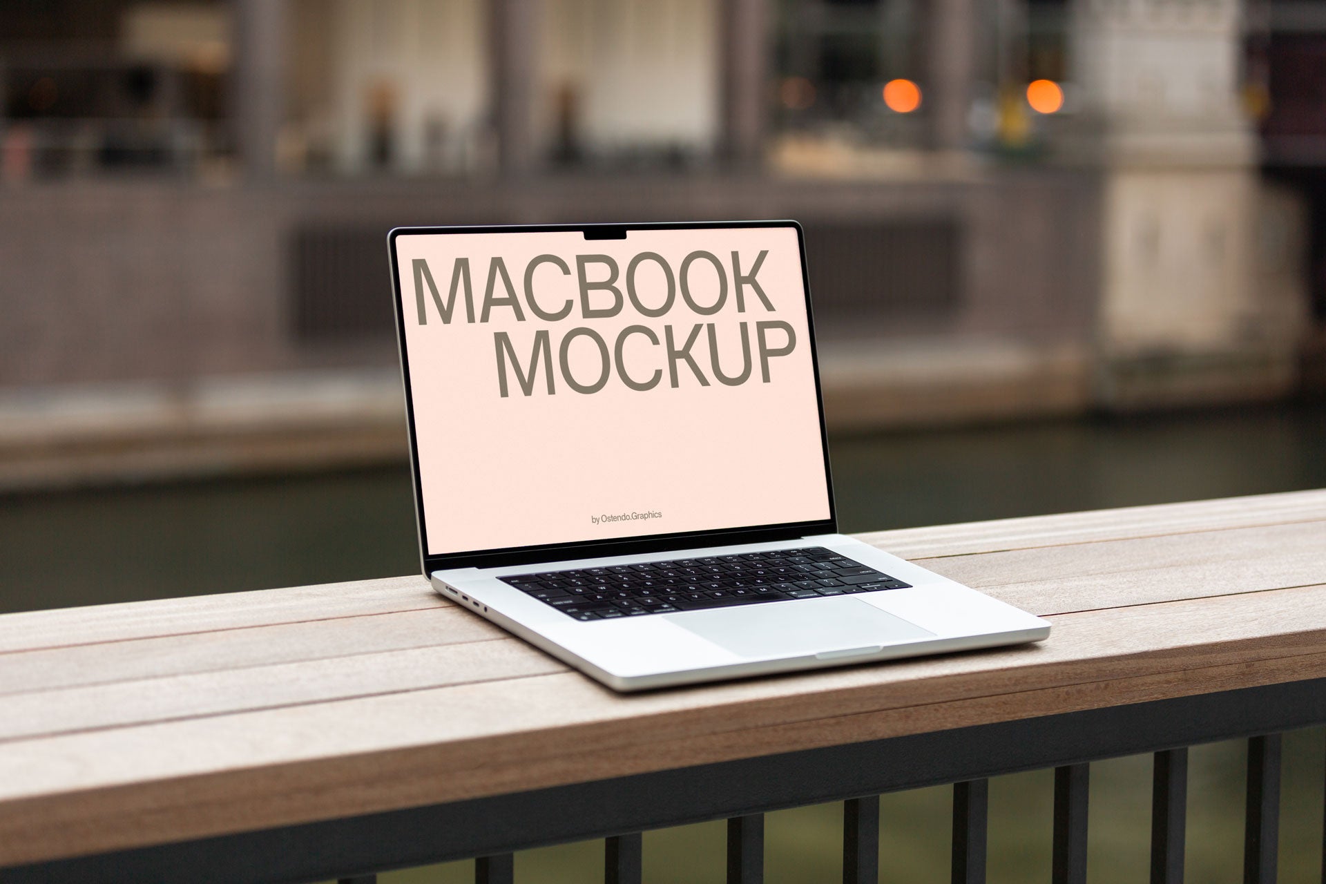 DD50 Macbook Pro Mockup on a Riverwalk Railing