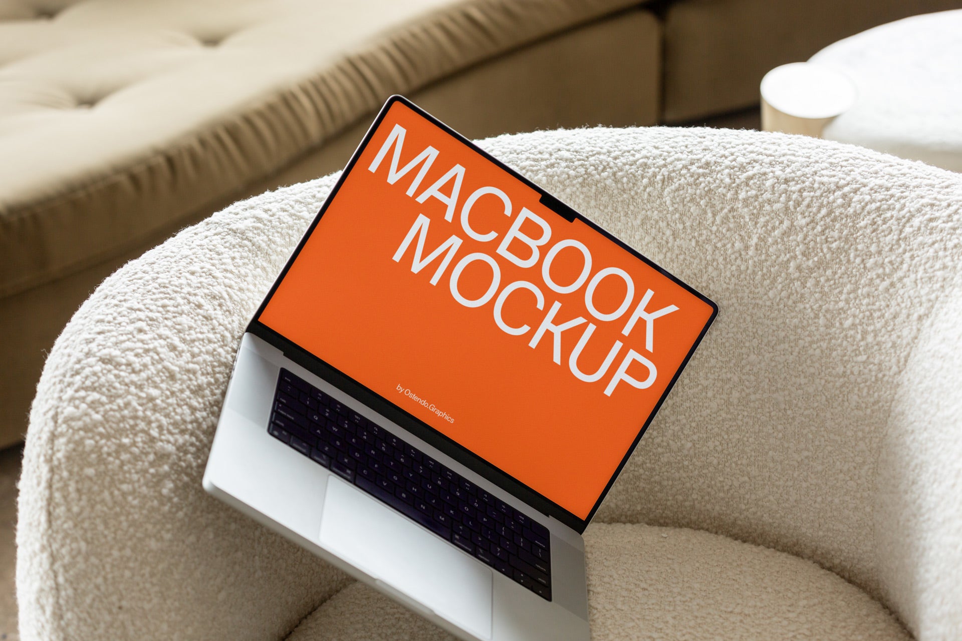 DD55 Macbook Pro Mockup on a Chair