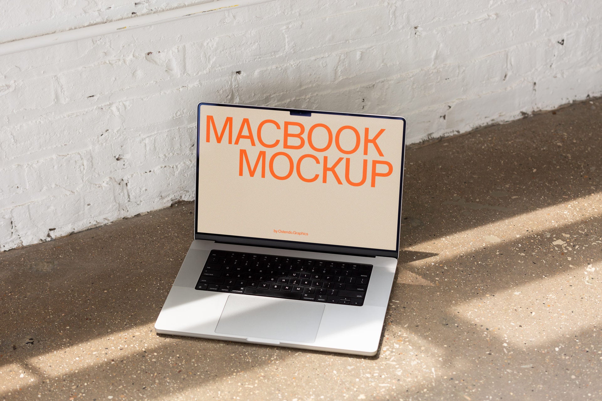 DD56 Macbook Pro Mockup on Concrete Studio Floor