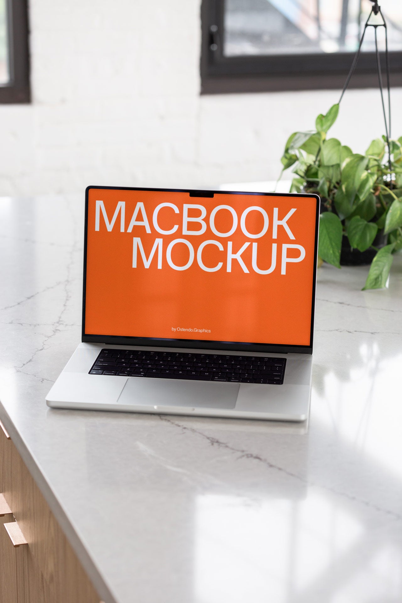 DD58 Macbook Pro Mockup on a Marble Counter