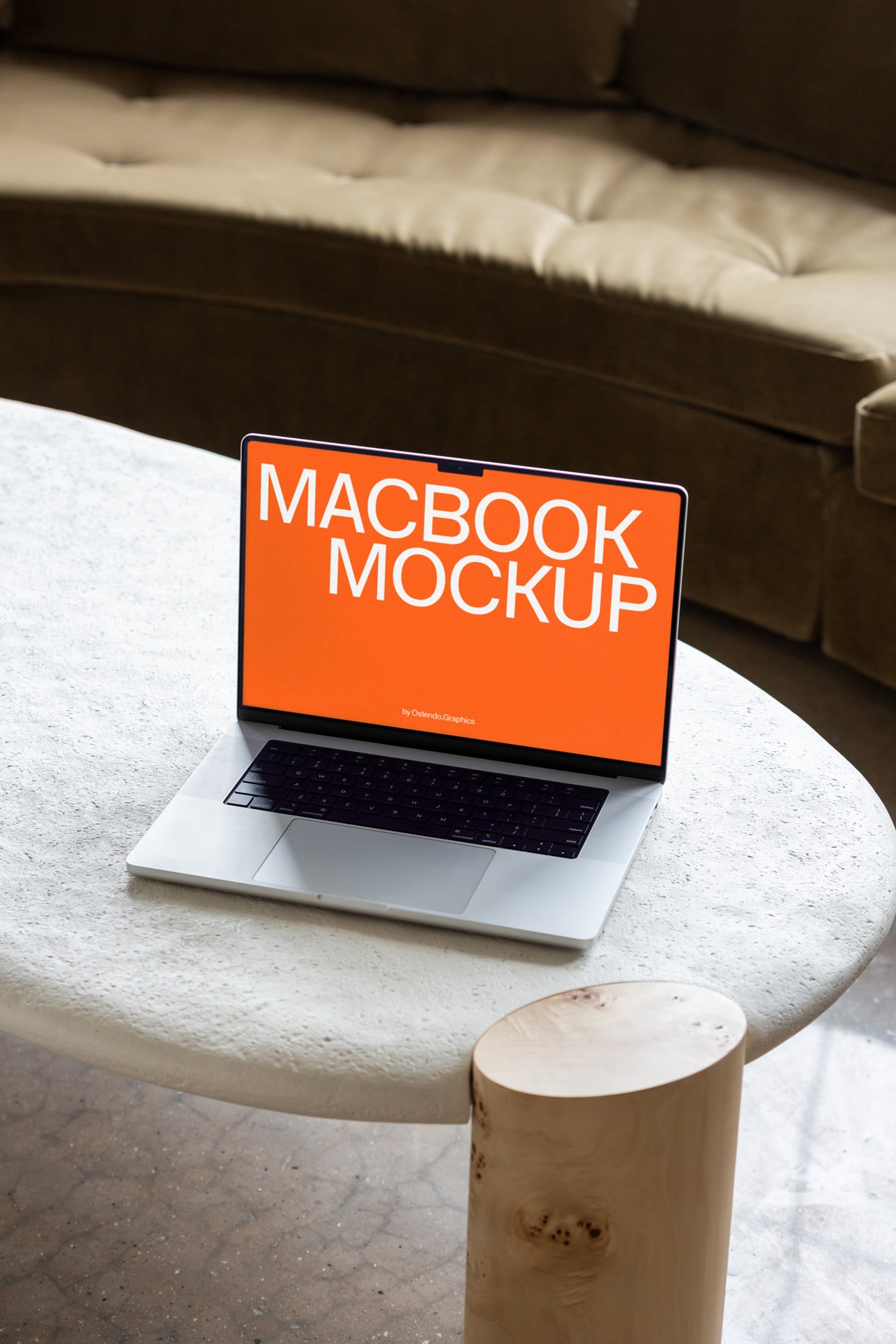 DD64 Macbook Pro Mockup on Stone Coffee Table