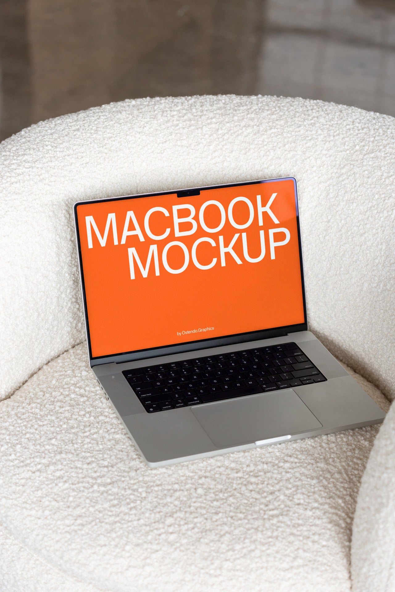DD66 Macbook Pro Mockup on a White Chair